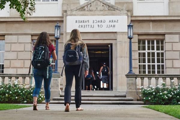 students in front of the Hall of Letters